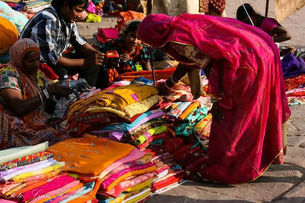 A woman shopping for clothes in Rajasthan, India