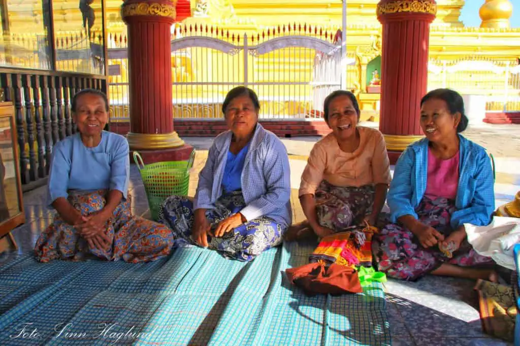 Women in Myanmar laughing after I had been sitting with them for a while communicating with sign language and smiles