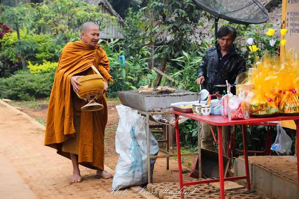 A monk receiving food