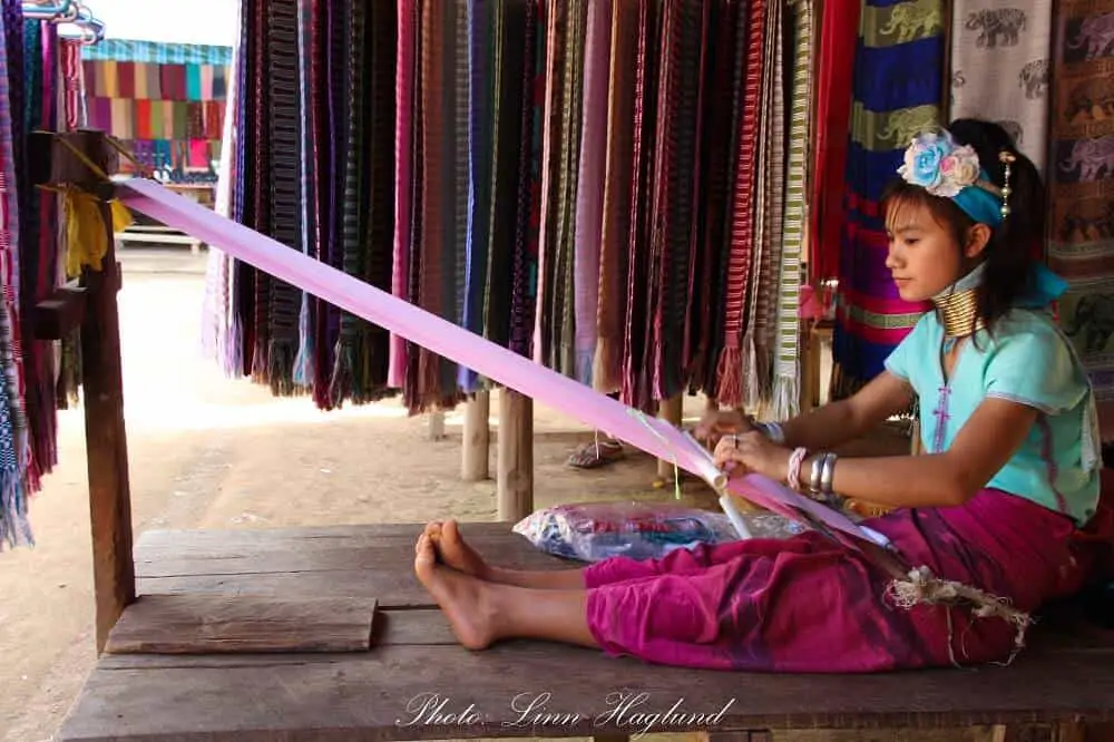 Long neck tribe woman working