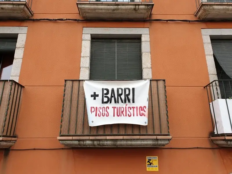 AirBnB protest sign in Barcelona | Food & Drink Destinations