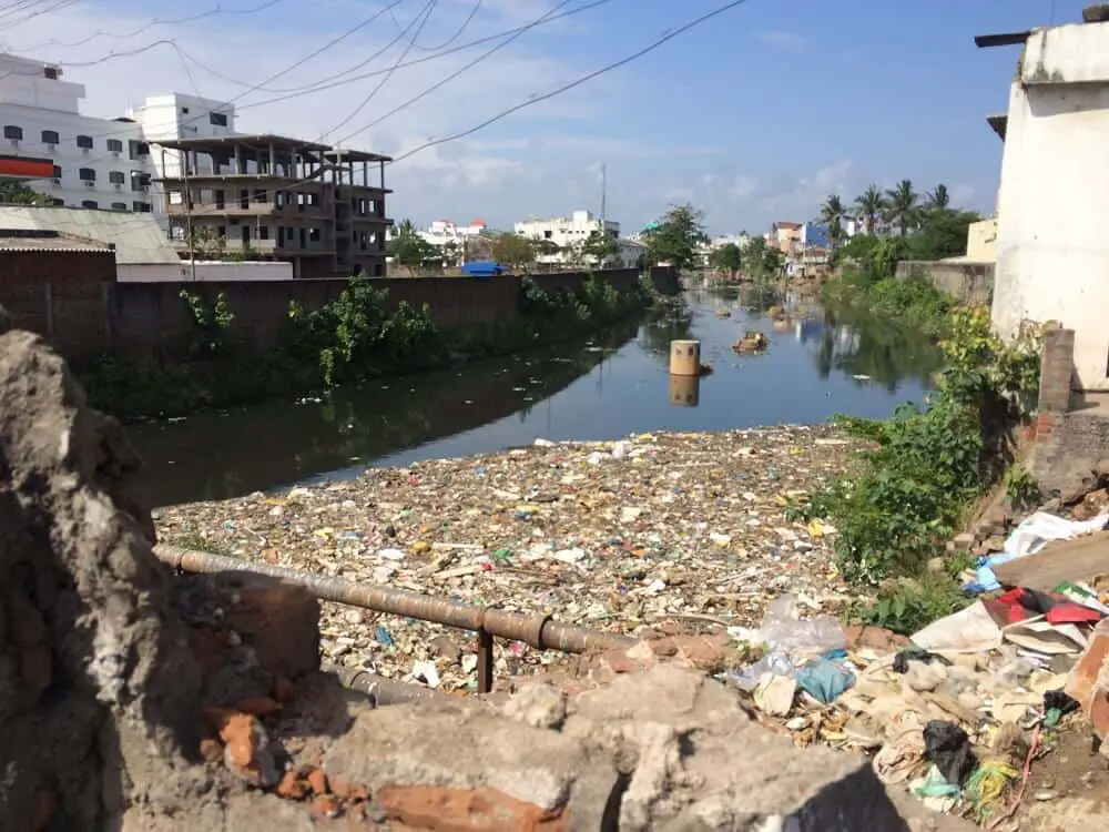 Rubbish floating in the water in Pondicherry in India