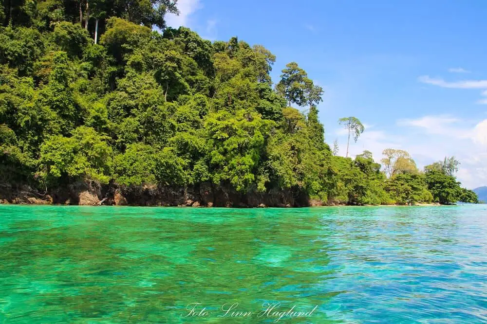 Take a kayaking or boat trip around the island to Emerald cave