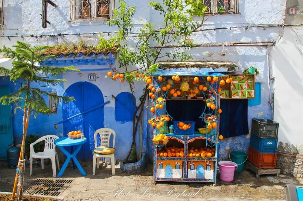 A beautiful orange juice kiosk