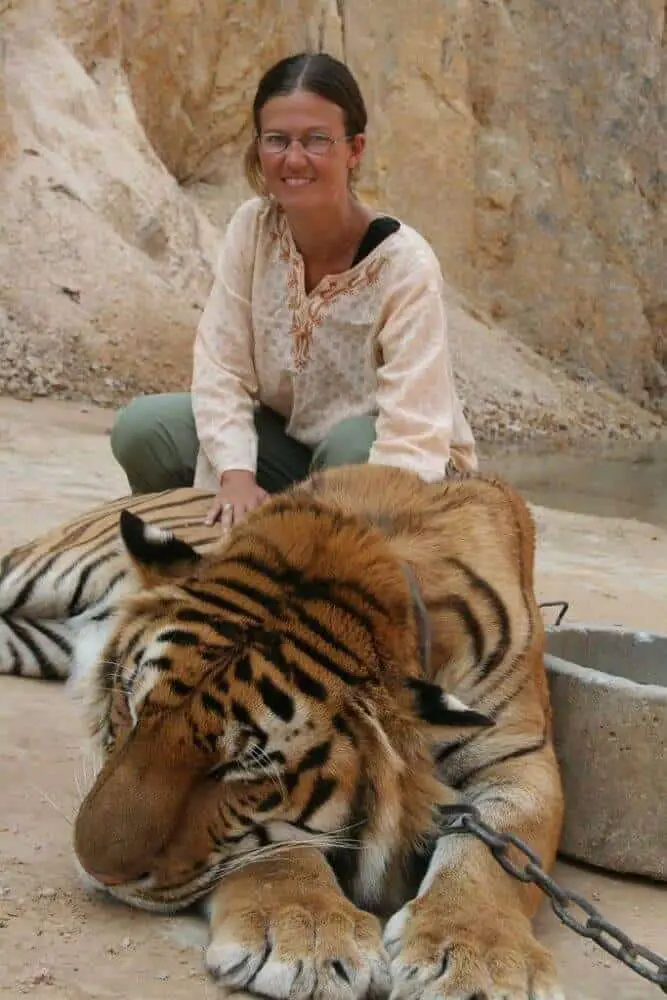 Tiger selfie in the Tiger Temple in Thailand. This is a place you should avoid visiting.