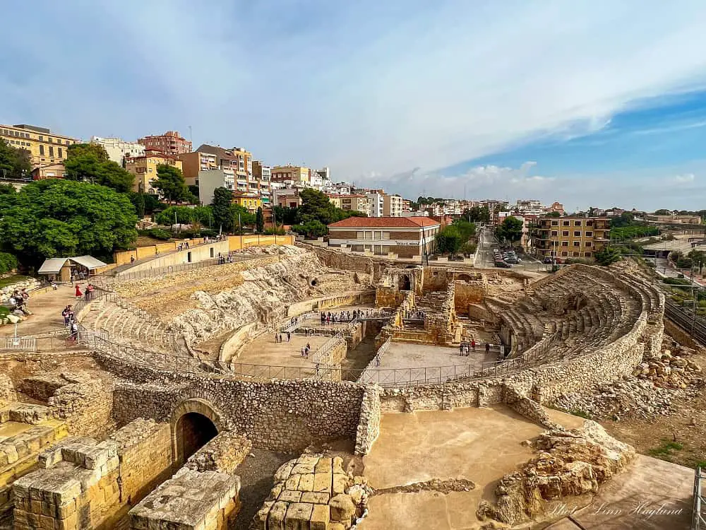 Ruins of a large Roman amphitheater in Tarragona, a true Spain hidden gem