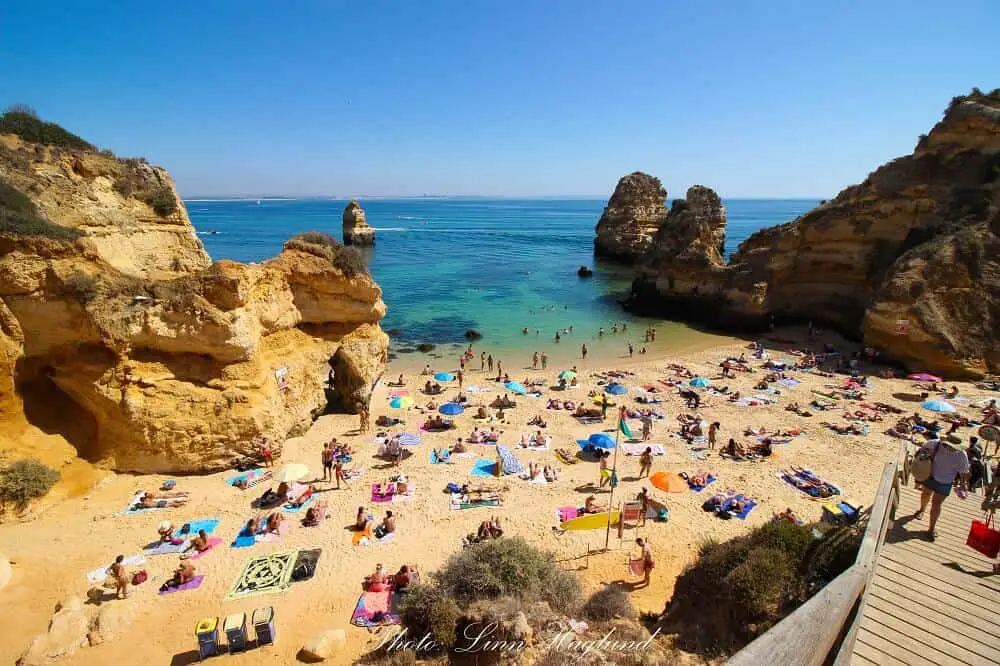 Driving in Algarve gets you to amasing beaches like Camilo beach in Lagos