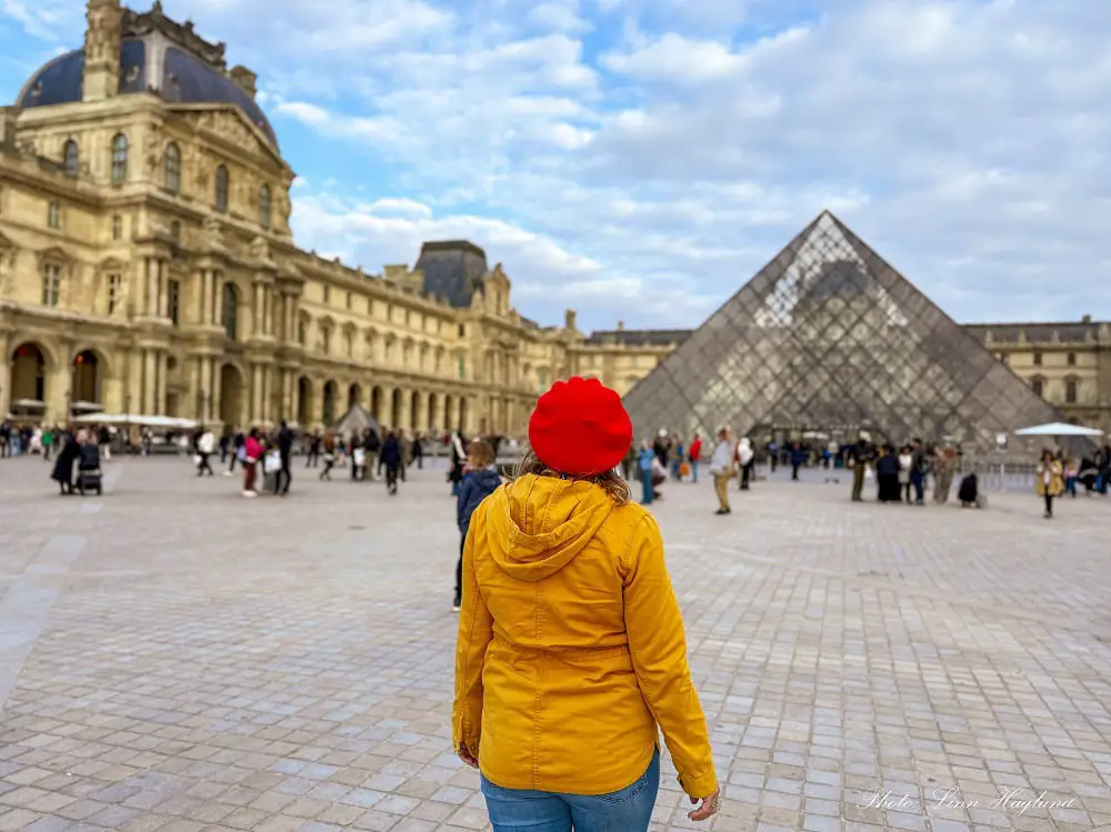Me looking at Le Louvre on a 4 day trip to Paris.