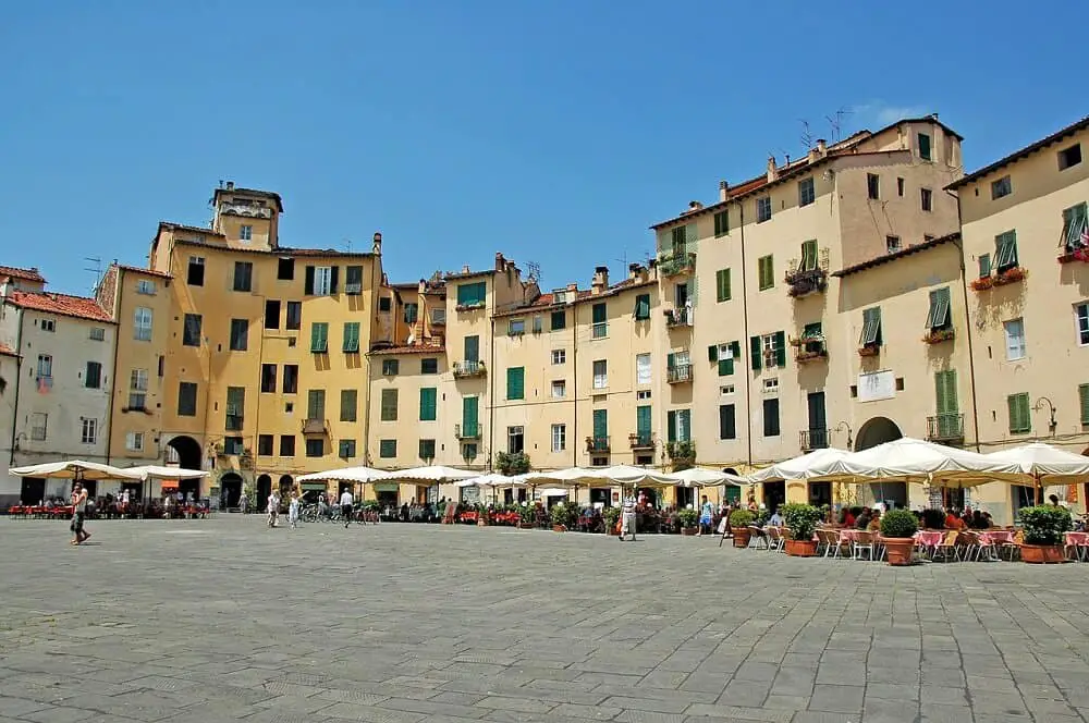Relax on Piazza dell' Anfiteatro when you visit Lucca in one day