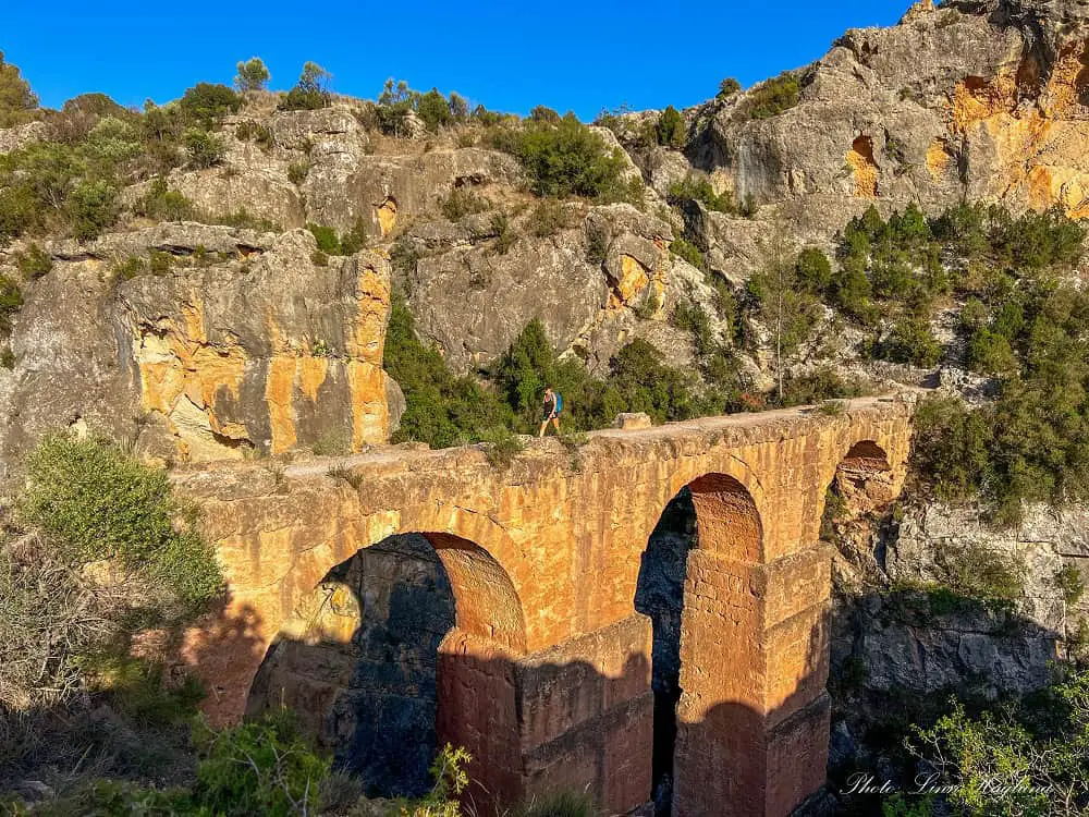 Me crossing an aqueduct while hiking in Spain near Valencia.