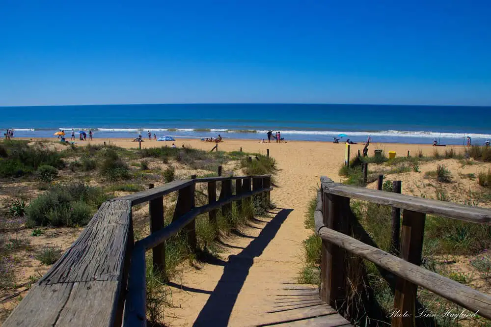 A wooden boardwalk leading down to the beach in Punta Umbria Huelva. This is one of the best beaches in Andalucia.