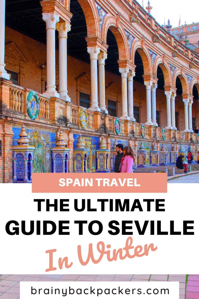 People walking around Plaza de España in Seville in winter.
