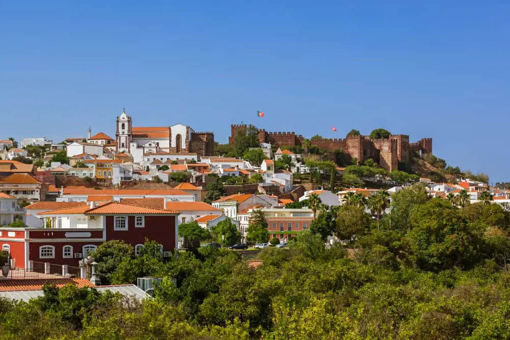 Hilltop castle overlooking the small town of Silves in the Algarve, which is one of the best day trips from Lagos, Portugal