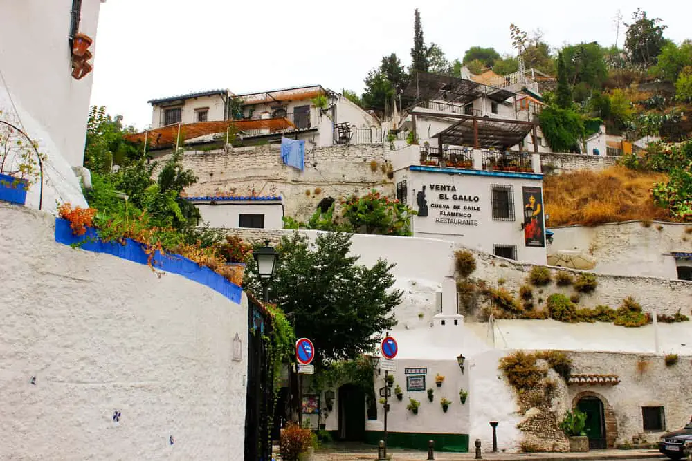 Sacromonte neighborhood, a whitewashed gypsy neighborhood with cave houses, which is a must-see in Granada in a day.