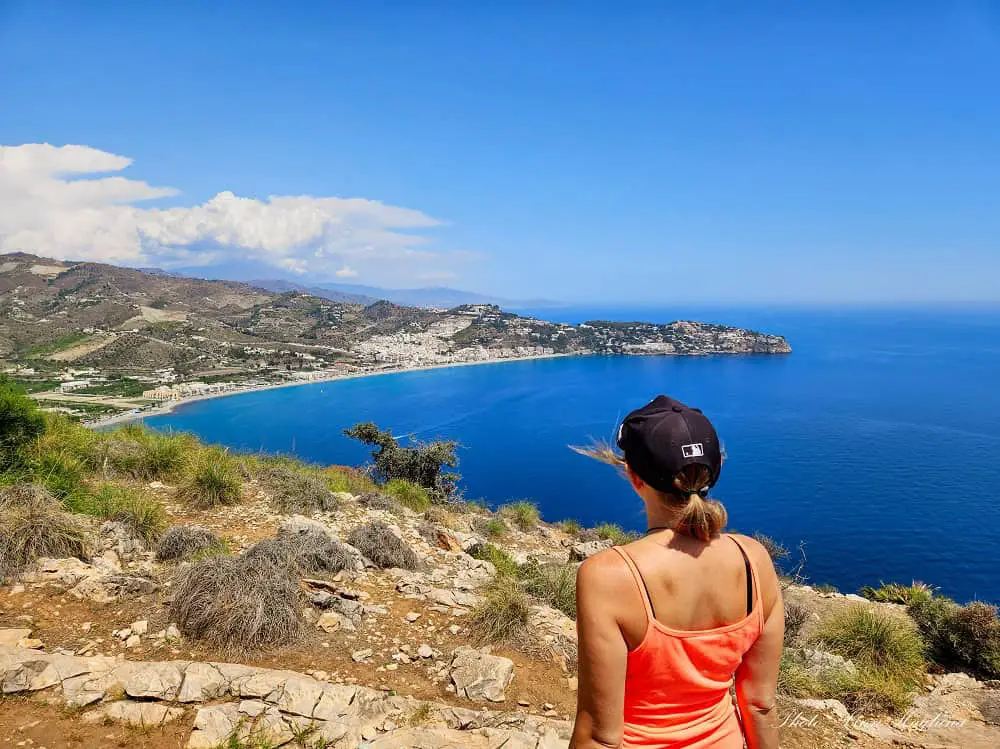 Me looking out over a beautiful bay, which is one of the many epic things to do in La Herradura Spain.