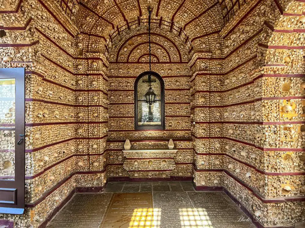 Thousands of bones decorating the walls and altarpiece in the Bone Chapel of Faro in southern Portugal.