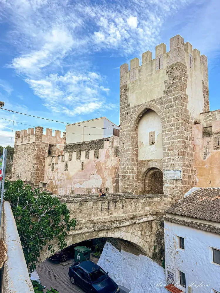 A medieval bridge leading to a gate in Buñol Castle.