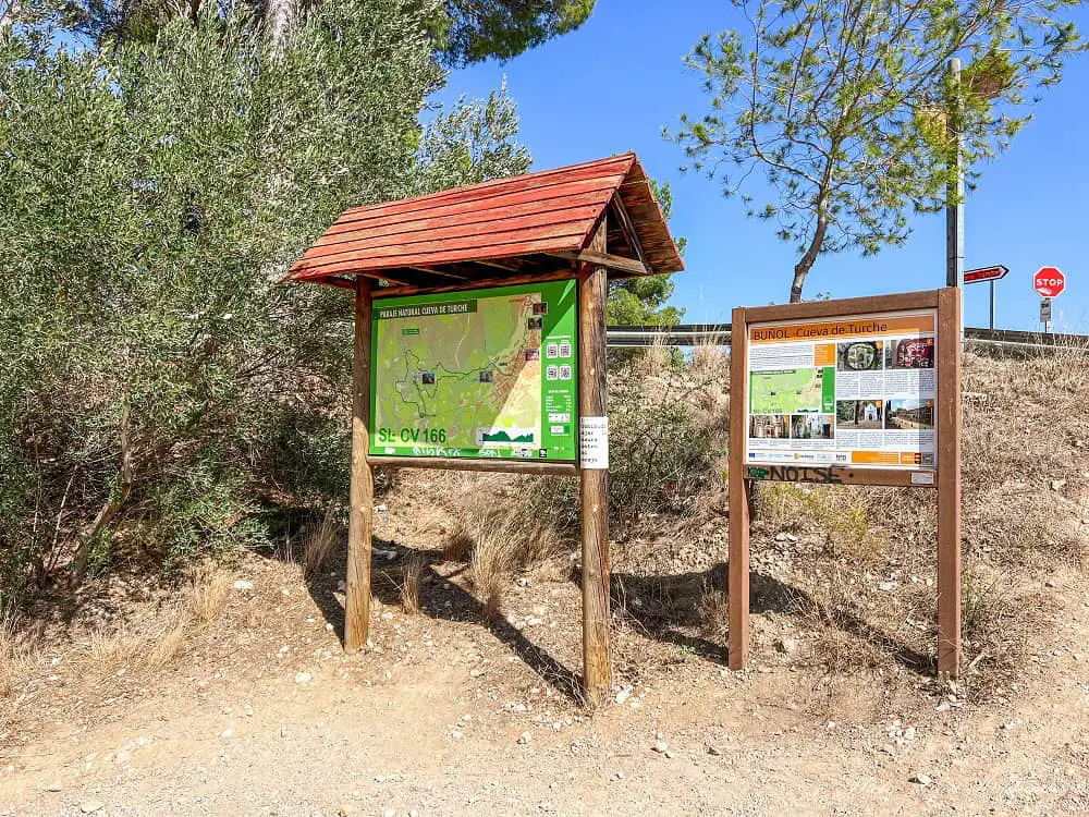 Hiking signs with trail maps.