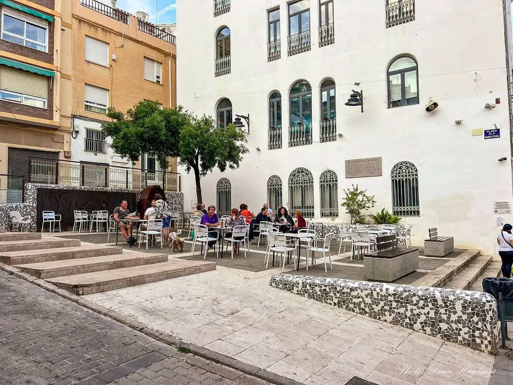 Restaurant tables on a square in Buñol Spain.