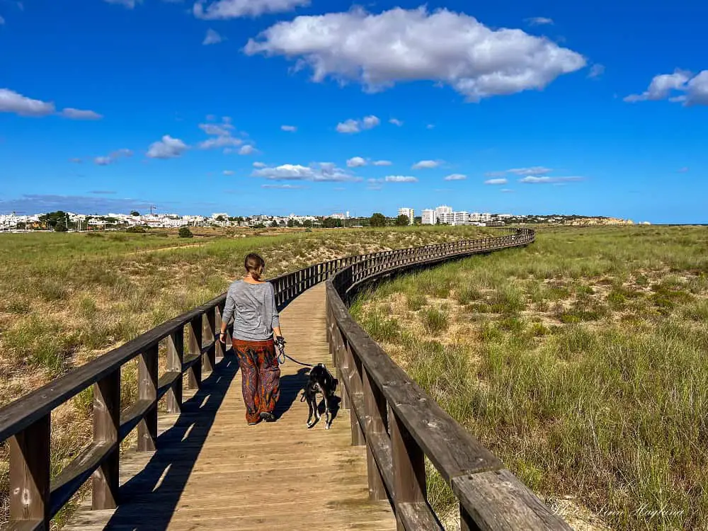 Me and Atlas walking Alvor Boardwalk.