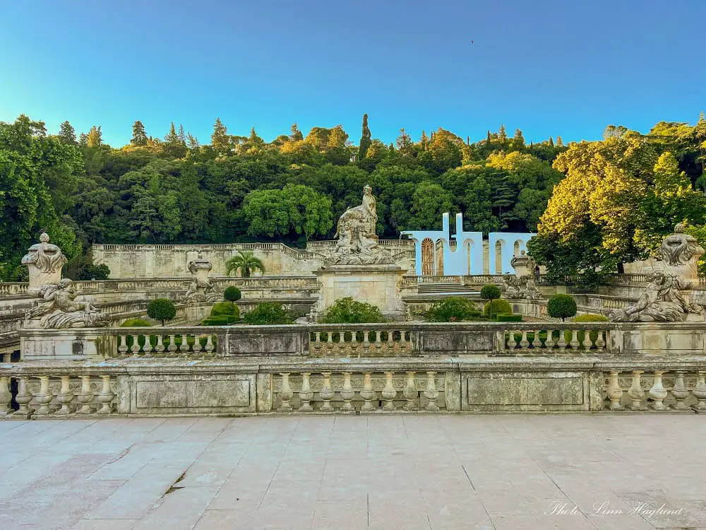 Is Nimes worth visiting - beautiful park with an elaborate fountain decorated with statues.