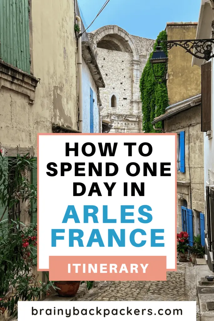 Pinterest image with a picture of Arles old town and the text "One day in Arles France itinerary".