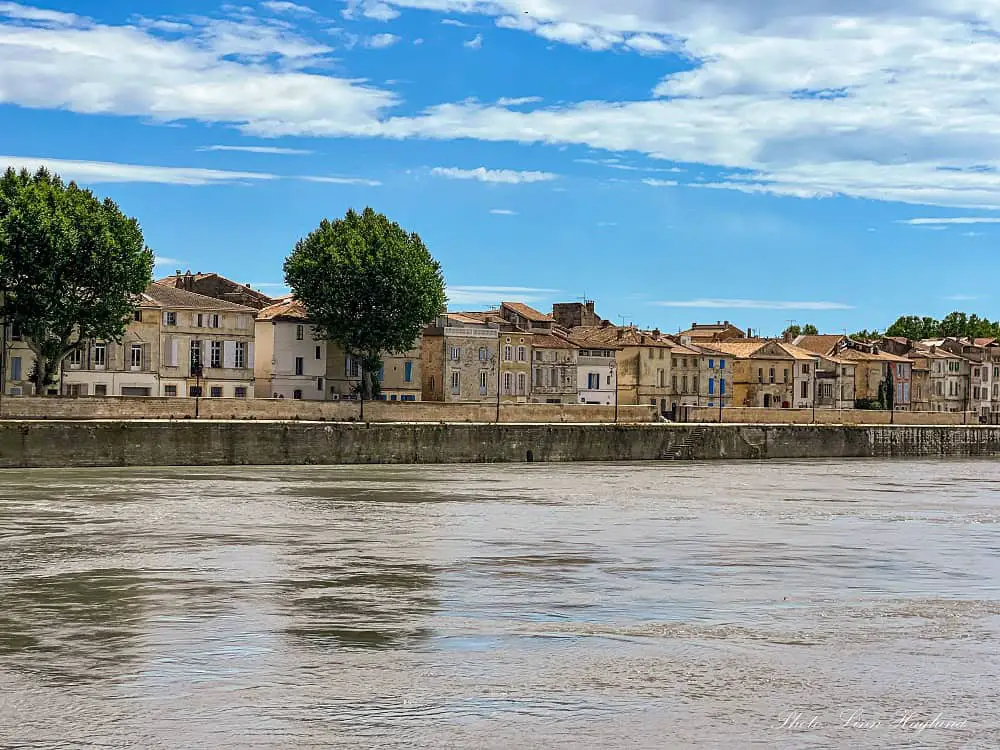 Houses along the riverfront, a walk that's one of the best things to do in Arles france.