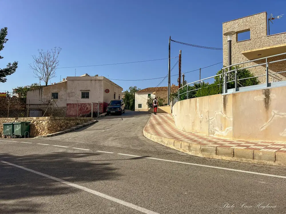 Mohammed walking in a street.