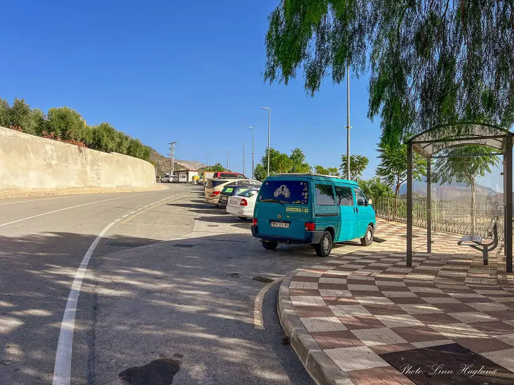 Parking and bus stop in Relleu.