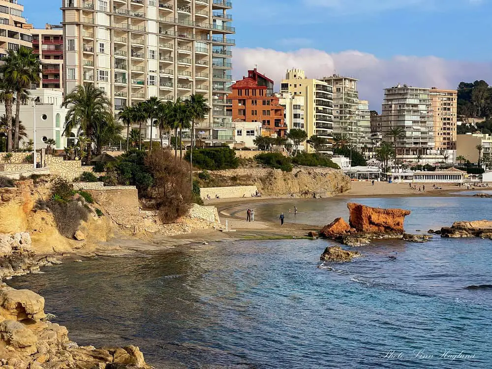 Coves in Calpe with ugly, tall buildings behind.