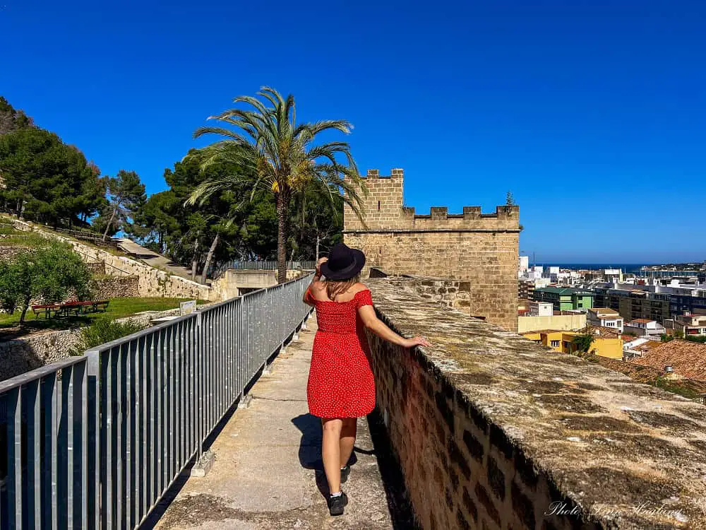 Me walking the castle walls of Denia Castle in one of the most beautiful Costa Blanca towns.