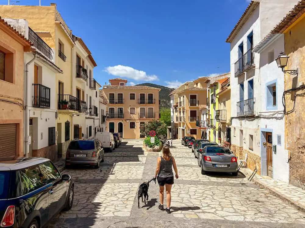 Me and Atlas walking towards a cute square in Finestrat Village Costa Blanca.