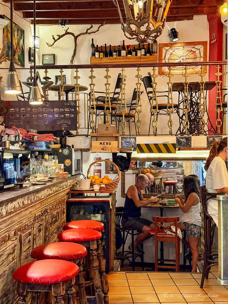 People having drinks in a Bar in Palma.
