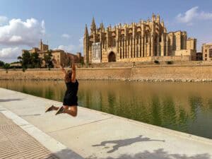 Me jumping infront of the veiw of Palma Cathedral.
