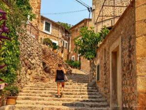 Walking in steps in Fornalutx, which is one of the most beautiful towns in Mallorca.