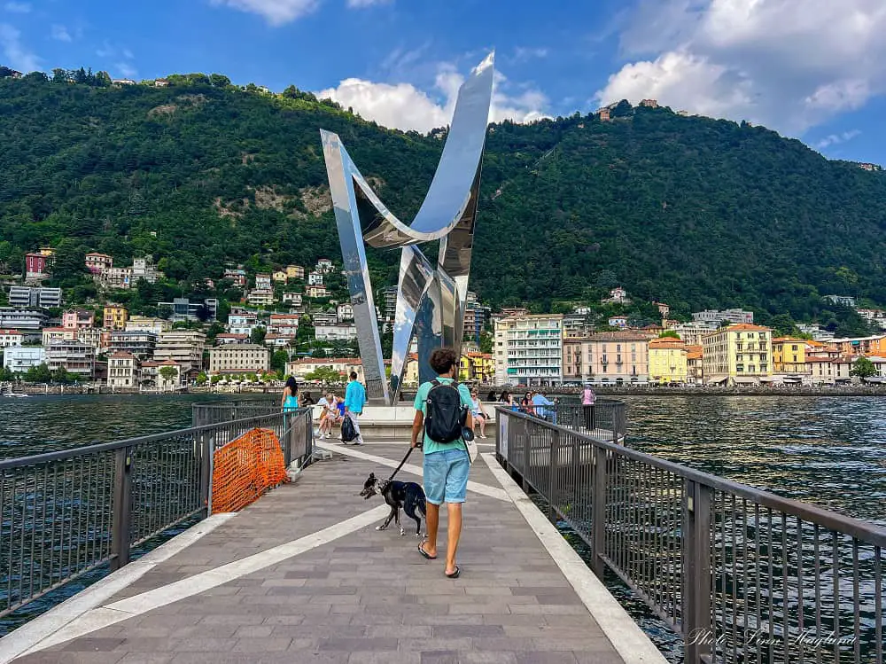 Mohammed and Atlas walking towards the Life Electic sculpture in the middle of Como Bay. This is one of the most modern things to see in Como Italy.
